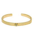 Gold bracelet with a diamond on a white background