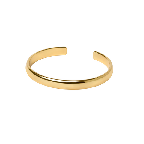 Gold bangle on a white background