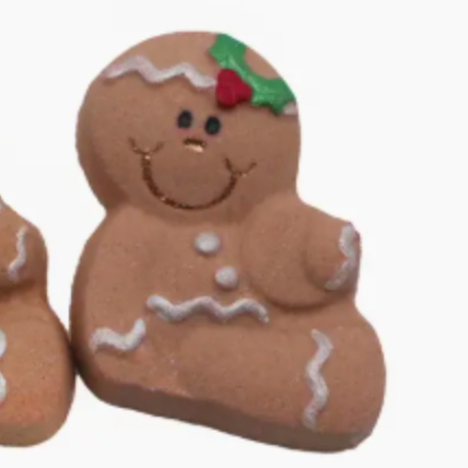 Two gingerbread cookie figurines with decorative elements on a white background