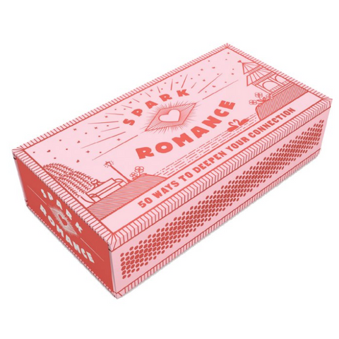 Pink book box with 'Spark Romance' branding on a white background