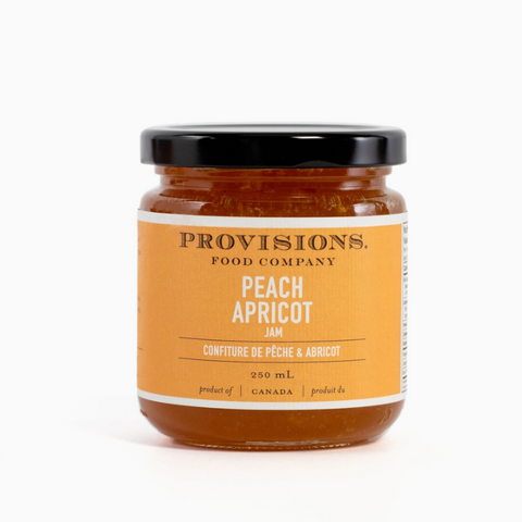 Jar of Provisions Food Company Peach Apricot spread on a white background