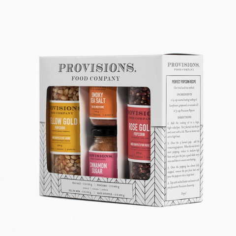 Provisions Food Company packaging with four small bottles of popcorn seasoning.