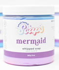 Jar of 'mermaid' whipped soap with colorful label on a white background