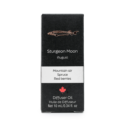 Black box of Sturgeon Moon diffuser oil with branding and product details on a white background