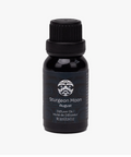 Black bottle of Sturgeon Moon diffuser oil on a white background
