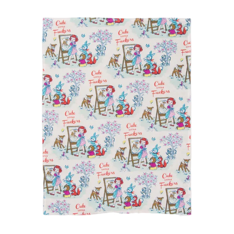 Towel with cartoon design and text on a white background