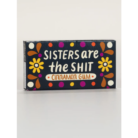 Cinnamon gum packaging with colorful text and graphics on a white background