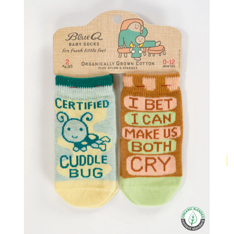 Two pairs of socks with humorous text on a white background, displayed on an e-commerce website.