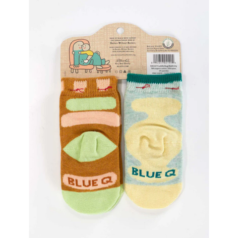 Two baby socks on a card with 'Blue Q' branding, displayed on an e-commerce website.