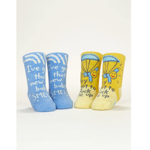 Pair of blue socks with text and a pair of yellow socks with text on a white background.
