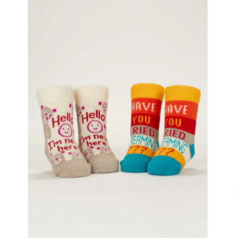 Set of baby socks with colorful text on a product page