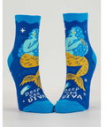 Blue socks with mermaid design labeled 'Deep Sea Diva' on a gray background