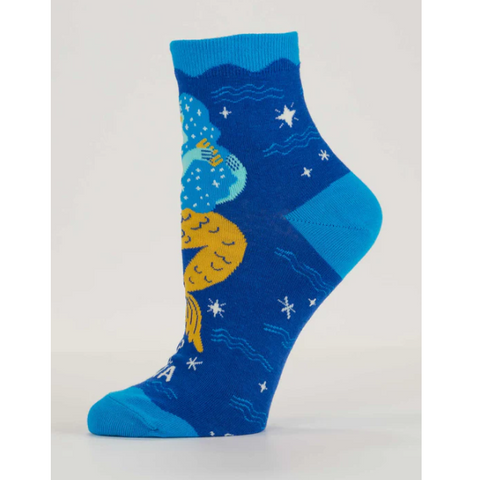 Blue ankle sock with celestial design on a product page