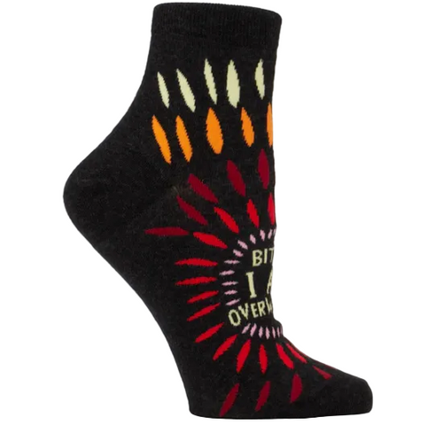 Black sock with colorful design and text on a website page