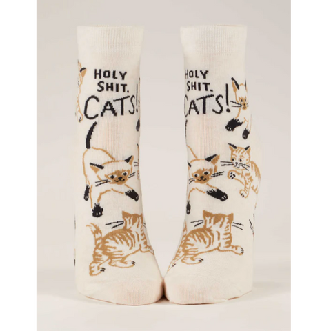 Pair of socks with cat illustrations and text on a product page.