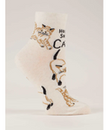Cat-themed socks with text on a product page
