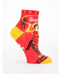 Red sock with graphic design on a white background