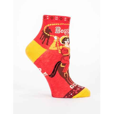Red sock with graphic design on a white background
