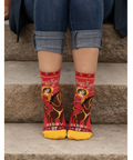 Red and yellow patterned socks with text on a product page