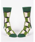 Green patterned socks on a white background with product details on a website.