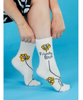 White socks with 'Friendly Bitch' text and floral designs on a blue background