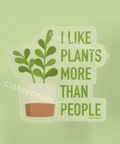 Sticker with plant and text 'I like plants more than people' on a green background