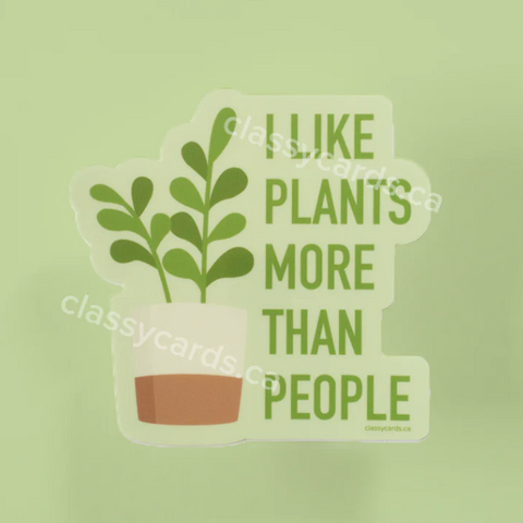Sticker with plant and text 'I like plants more than people' on a green background