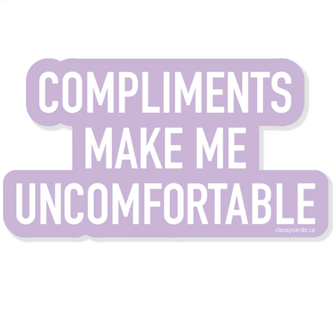 Sticker with text 'COMPLIMENTS MAKE ME UNCOMFORTABLE' on a white background