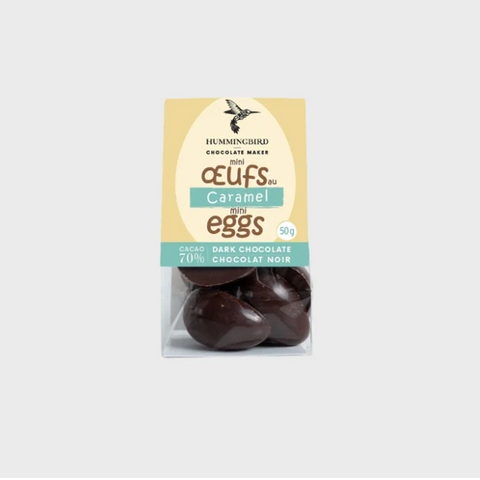 Chocolate eggs packaging on a website page with 'Hummingbird Chocolate Maker' branding.