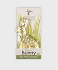 Chocolate bar packaging with gold bunny design on a white background