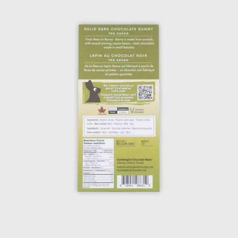 Solid dark chocolate bunny packaging with green label on a white background