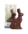 Chocolate rabbit with packaging on a white background
