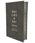 Gray memory book titled 'One Line a Day' on a white background
