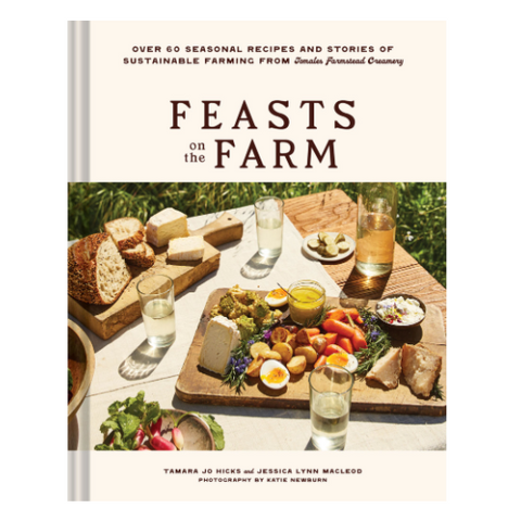 Book cover of 'Feasts on the Farm' with a table setting and food.