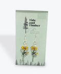 Pair of earrings on a 'Tide and Timber' branded card