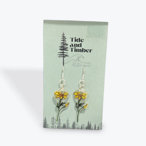 Pair of earrings on a 'Tide and Timber' branded card
