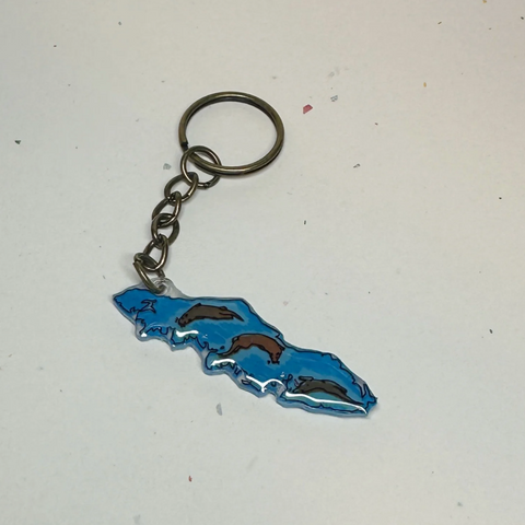 Keychain with a blue design on a light gray background