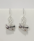 Pair of silver earrings with marbled design on a white background