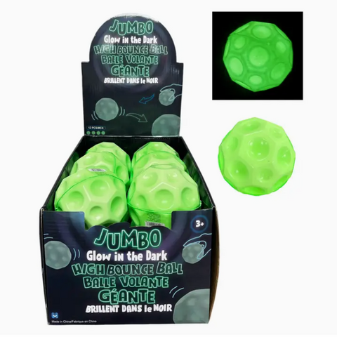 Green jumbo glow-in-the-dark ball with packaging on a white background