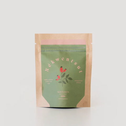 Green and brown package with brand name on a light gray background