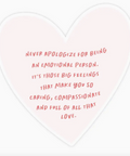 Heart-shaped card with inspirational quote on a white background