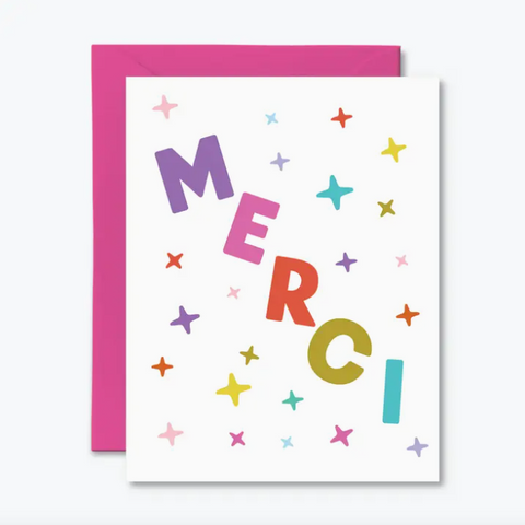 Greeting card with 'Merci' in colorful letters and stars on a white background