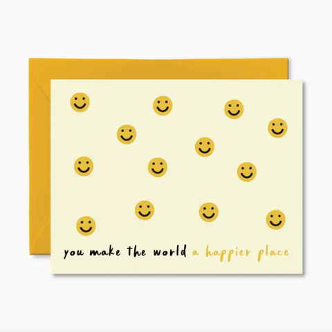 Card with smiley face pattern and text 'you make the world a happier place' on a white background