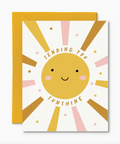 Greeting card with a sun illustration and 'Sending you sunshine' text on a white background