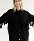Woman wearing a black fringe jacket on a product page with pricing and size information.