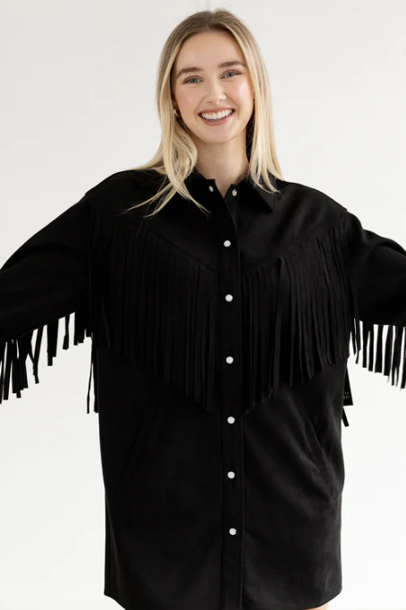 Woman wearing a black fringe jacket on a product page with pricing and size information.