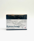 Bar of soap with 'Raven Song' branding on a white background
