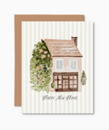 Greeting card with a house illustration and 'Happy New Home' text on a striped background