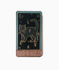 Pin with a cat design on a black background, labeled 'The Star'.