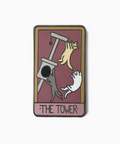 Enamel pin with 'The Tower' tarot card design featuring cats and a ladder.